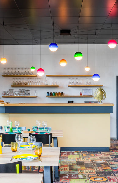 Dipping Pendant Light by Marset, showing dipping pendant lights in live shot.