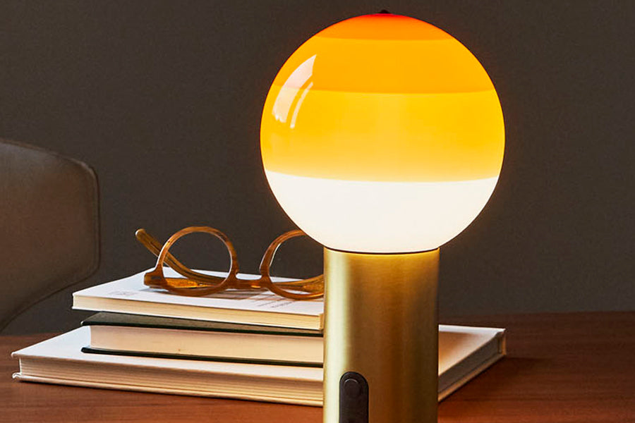 Dipping Portable Lamp by Marset, showing dipping portable lamp in live shot.