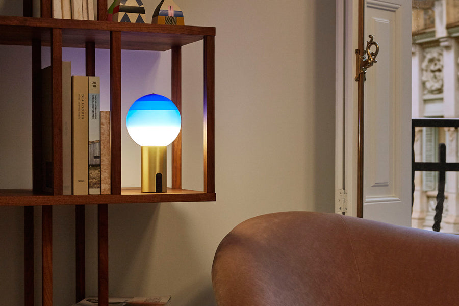Dipping Portable Lamp by Marset, showing dipping portable lamp in live shot.