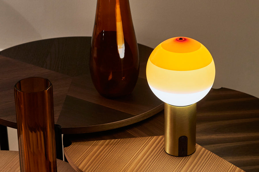 Dipping Portable Lamp by Marset, showing dipping portable lamp in live shot.