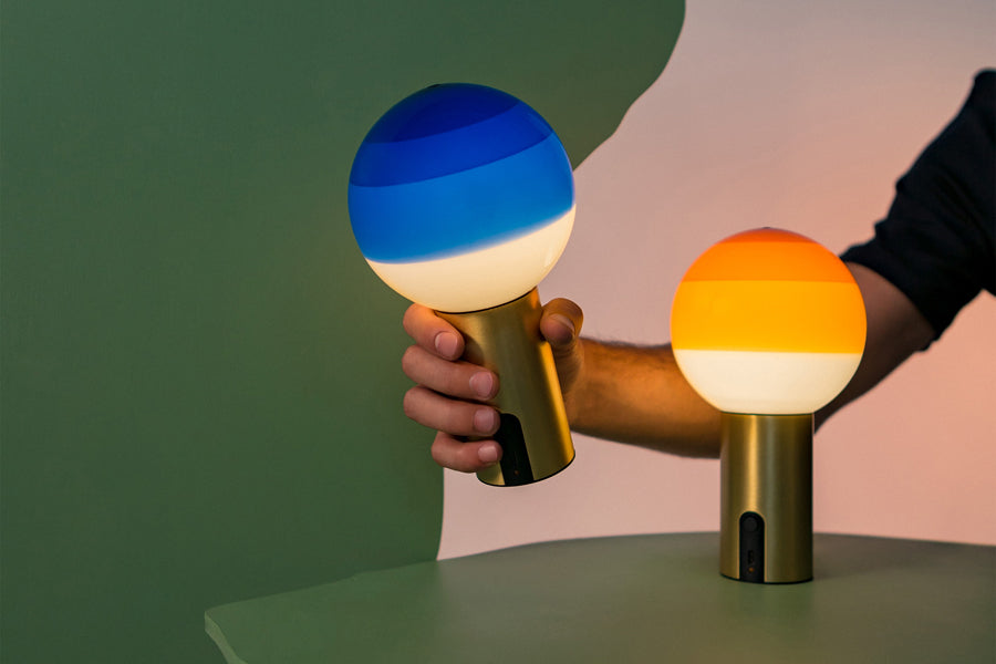 Dipping Portable Lamp by Marset, showing dipping portable lamps in live shot.