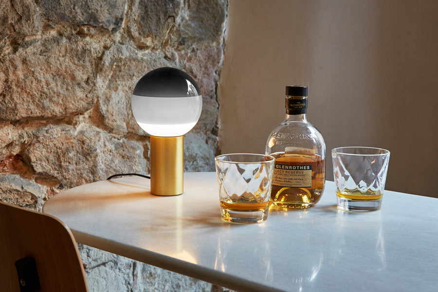 Dipping Table Lamp by Marset, showing dipping table lamp in live shot.