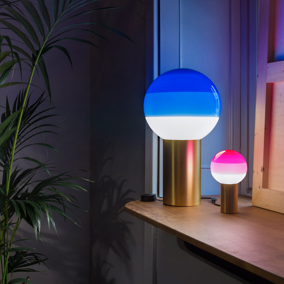 Dipping Table Lamp by Marset, showing dipping table lamps in live shot.