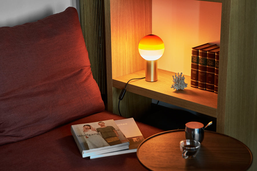 Dipping Table Lamp by Marset, showing dipping table lamp in live shot.