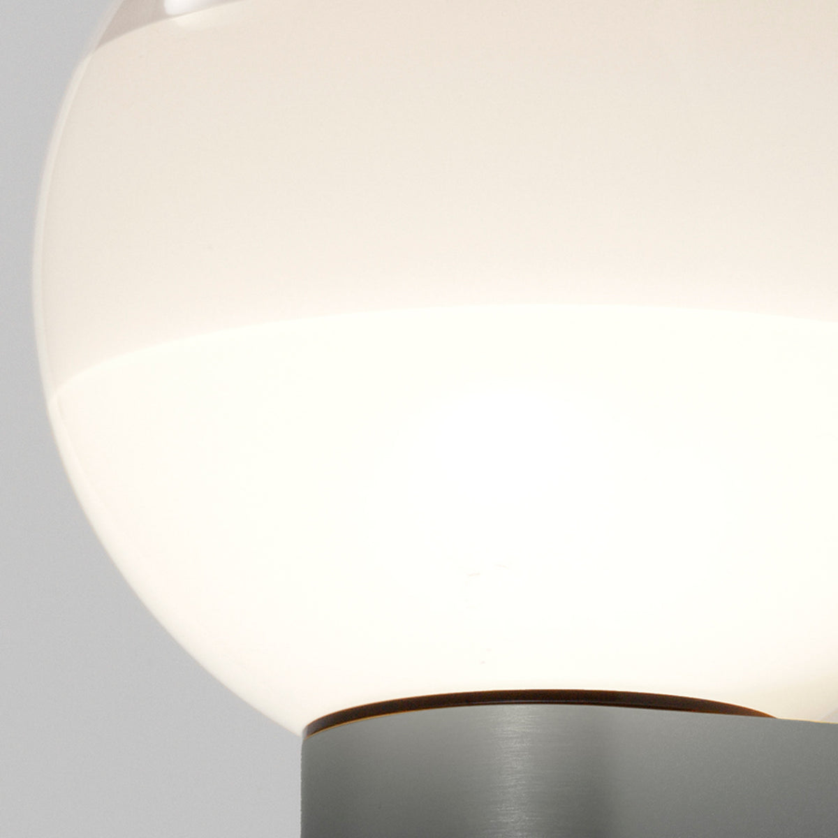 Dipping Wall Lamp by Marset, showing closeup view of dipping wall lamp in live shot.
