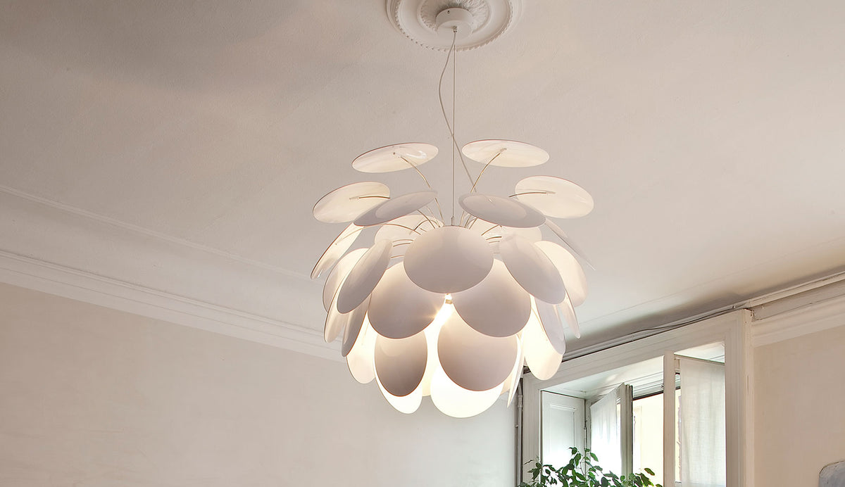 Discoco Pendant Lamp by Marset, showing discoco pendant lamp in live shot.