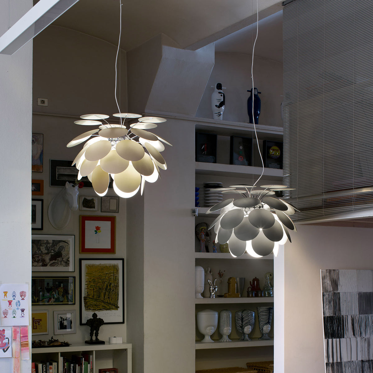 Discoco Pendant Lamp by Marset, showing discoco pendant lamps in live shot.