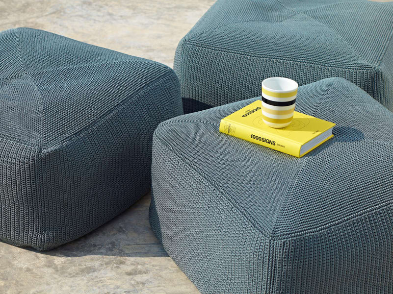 Divine Footstool by Cane-Line, showing divine footstools in live shot.