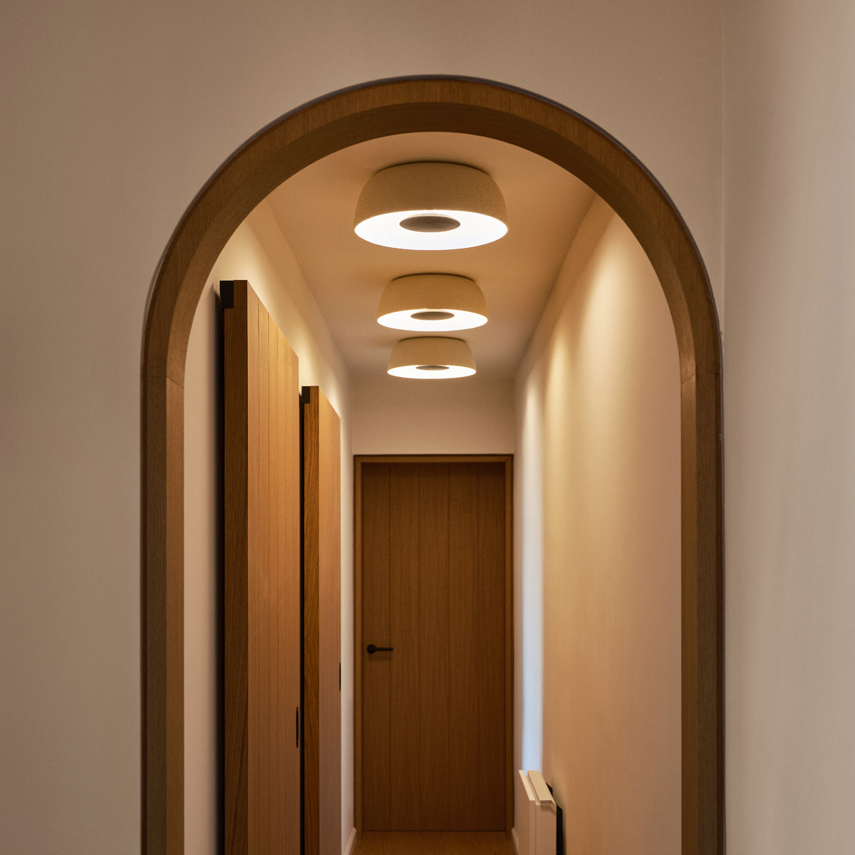 Djembe 100 Ceiling Lamp by Marset, showing djembe 100 ceiling lamps in live shot.