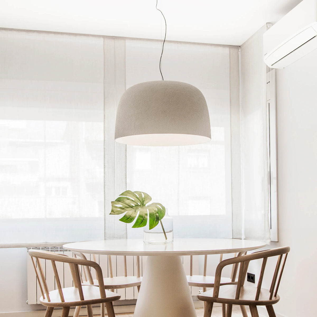 Djembe Pendant Lamp by Marset, showing djembe pendant lamp in live shot.