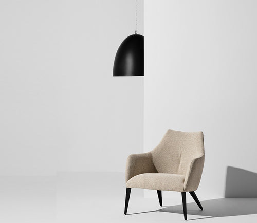 Dome Pendant by Nuevo, showing front view of matte black steel shade pendant in live shot.
