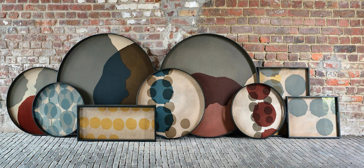 Dots Glass Tray by Ethnicraft, showing dots glass trays in live shot.