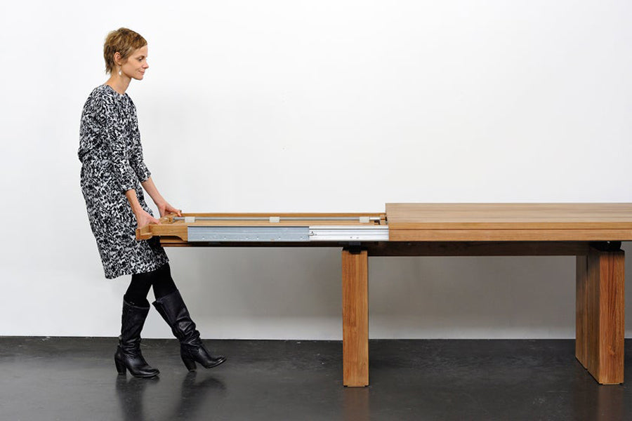 Double Extendable Dining Table by Ethnicraft, showing double extendable dining table in live shot.