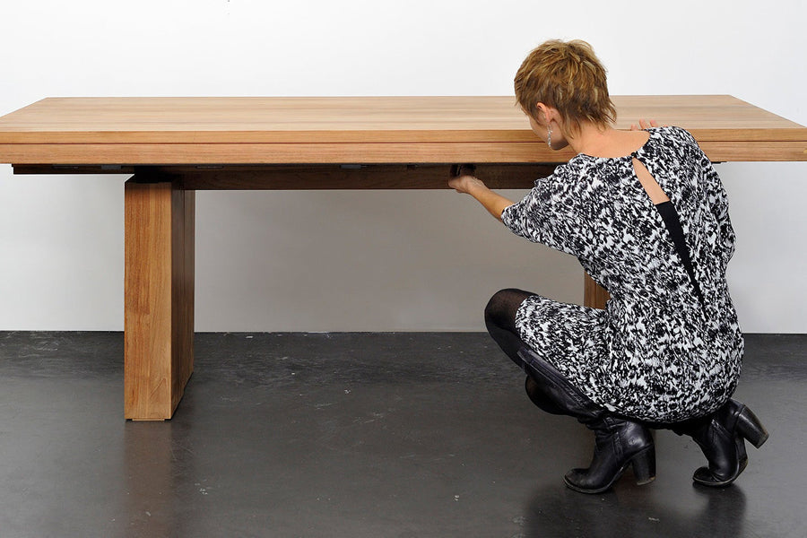 Double Extendable Dining Table by Ethnicraft, showing double extendable dining table in live shot.