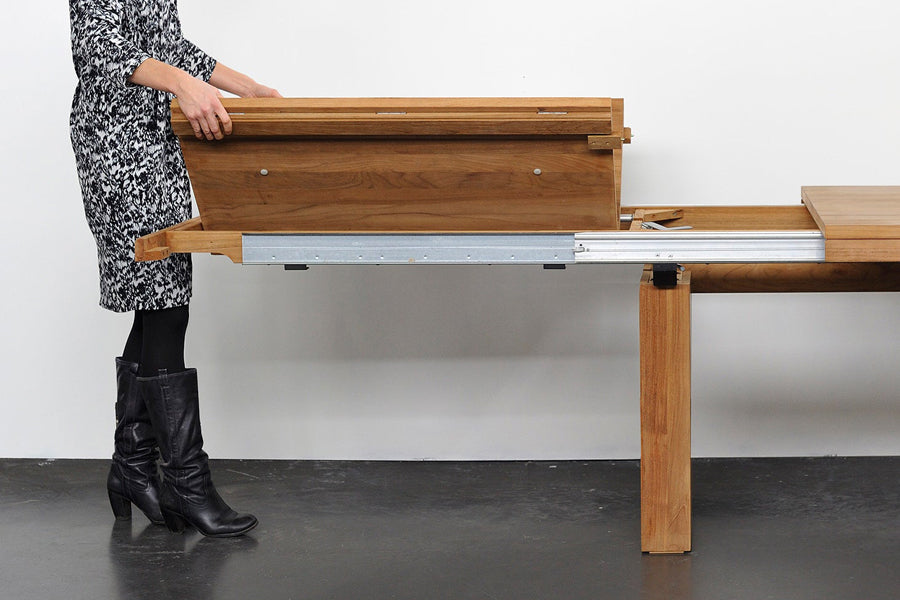 Double Extendable Dining Table by Ethnicraft, showing double extendable dining table in live shot.