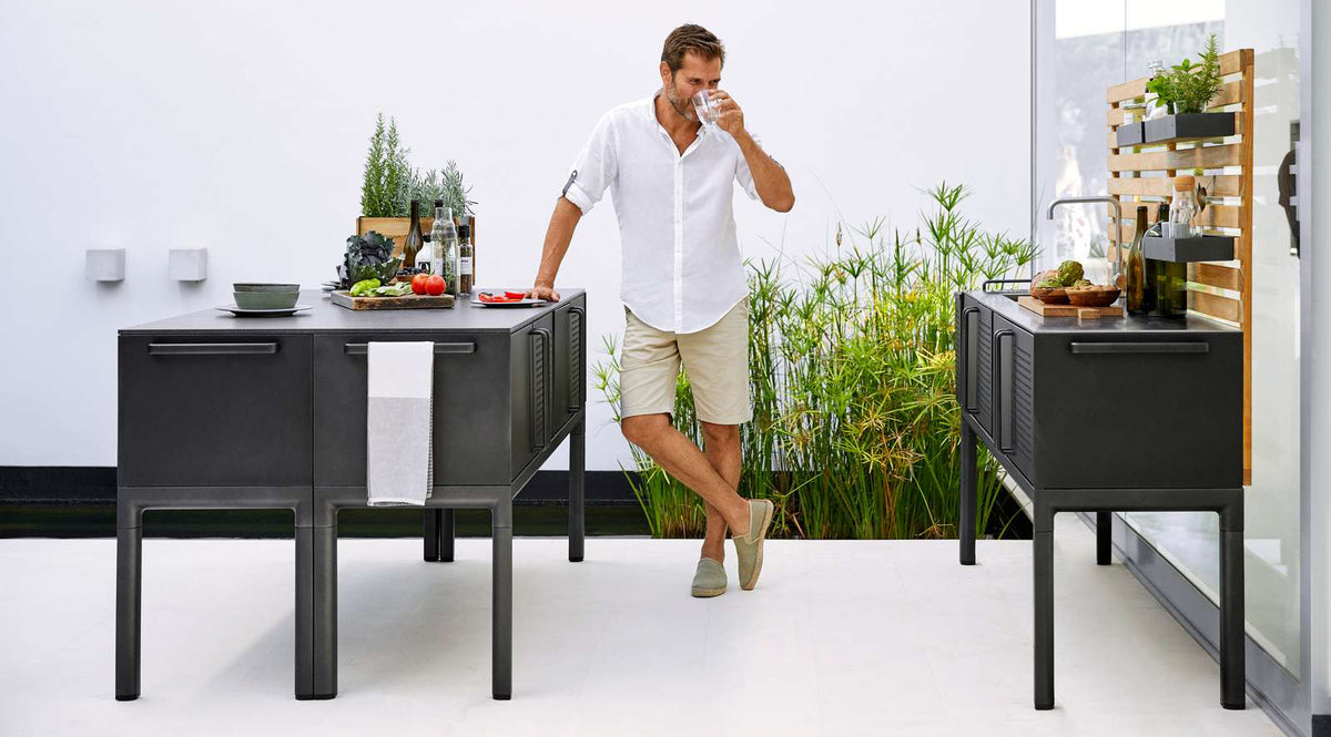 Drop Kitchen Module by Cane-Line, showing drop kitchen modules in live shot.