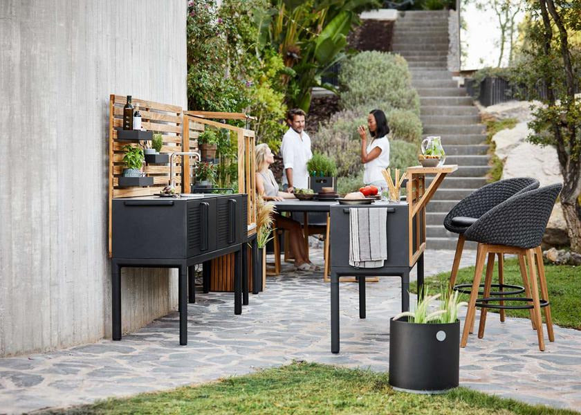 Drop Outdoor Kitchen Bar by Cane-Line, showing drop outdoor kitchen bar with module in live shot.
