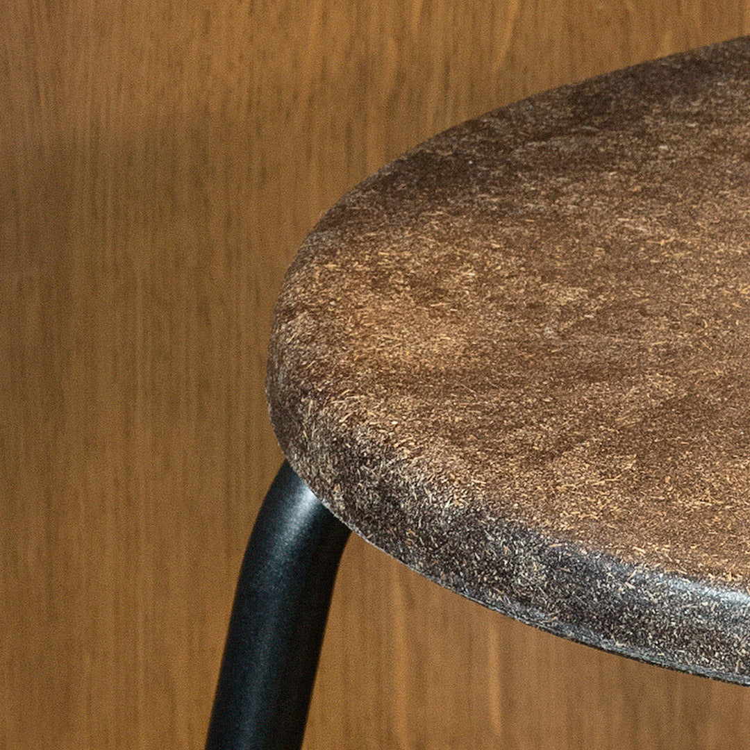 Earth Stool by Mater, showing closeup view of earth stool in live shot.