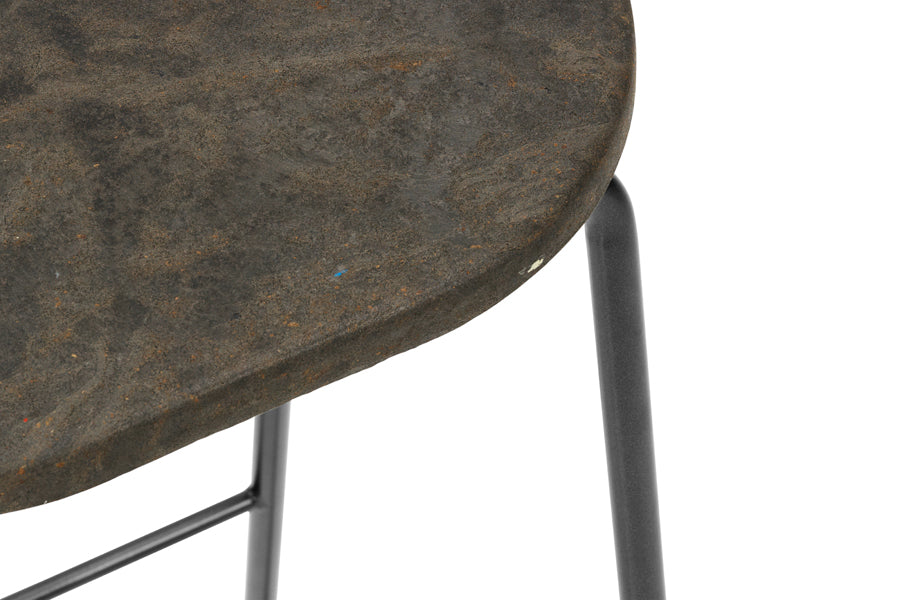 Earth Stool by Mater, showing closeup view of earth stool in coffee waste edition seat.