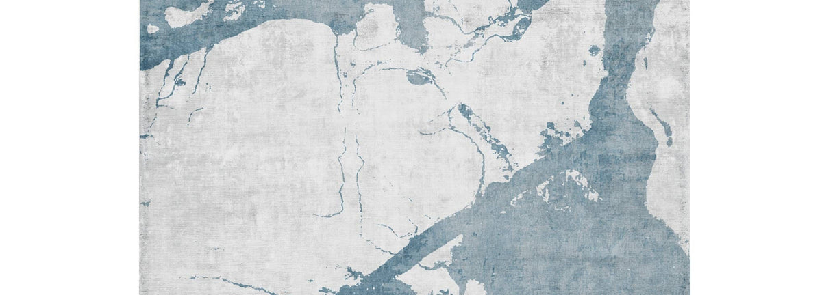 Eastern Side of Arenzano EA1700 Rug by Second Studio, showing closeup view of eastern side of arenzano ea1700 rug by second studio in bright grey and denim blue.