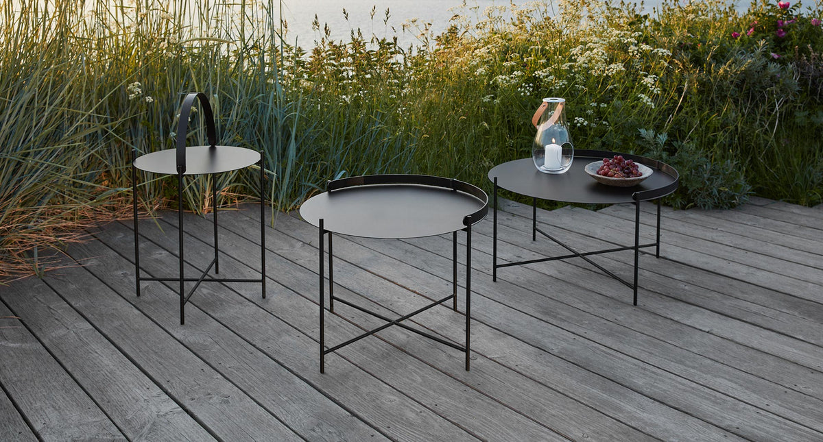 Edge Outdoor Tray Table by Houe, showing edge outdoor tray tables in live shot.