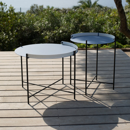 Edge Outdoor Tray Table by Houe, showing edge outdoor tray tables in live shot.