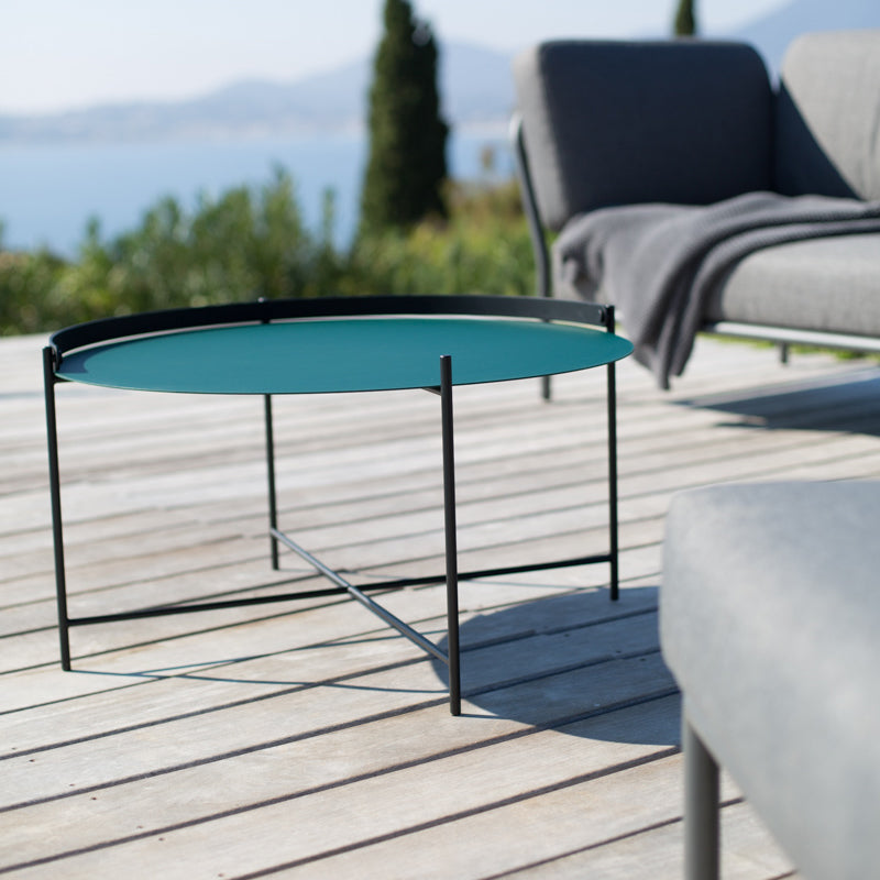 Edge Outdoor Tray Table by Houe, showing edge outdoor tray table in live shot.