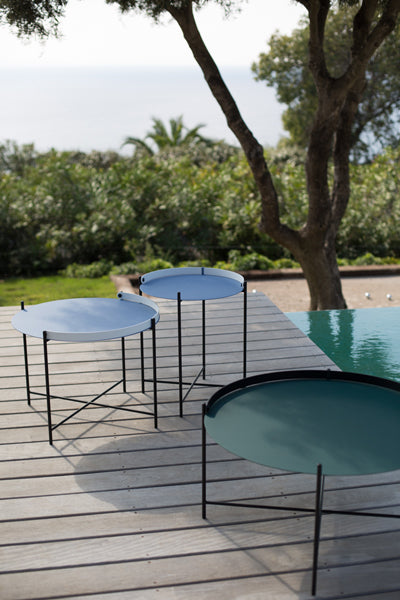 Edge Outdoor Tray Table by Houe, showing edge outdoor tray tables in live shot.