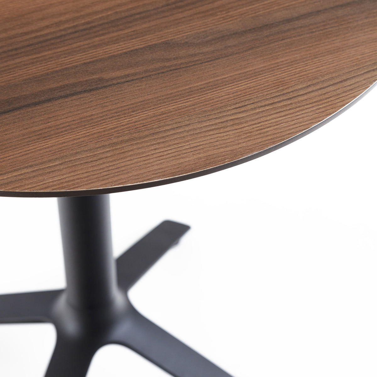 EEX Wood Cocktail Table by Toou, showing closeup view of eex wood cocktail table in round/black/walnut wood top.