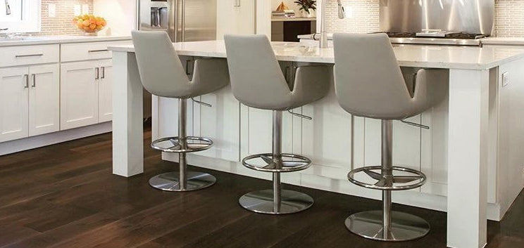 Eiffel Arm Piston Stool by SohoConcept, showing arm piston stools in live shot.
