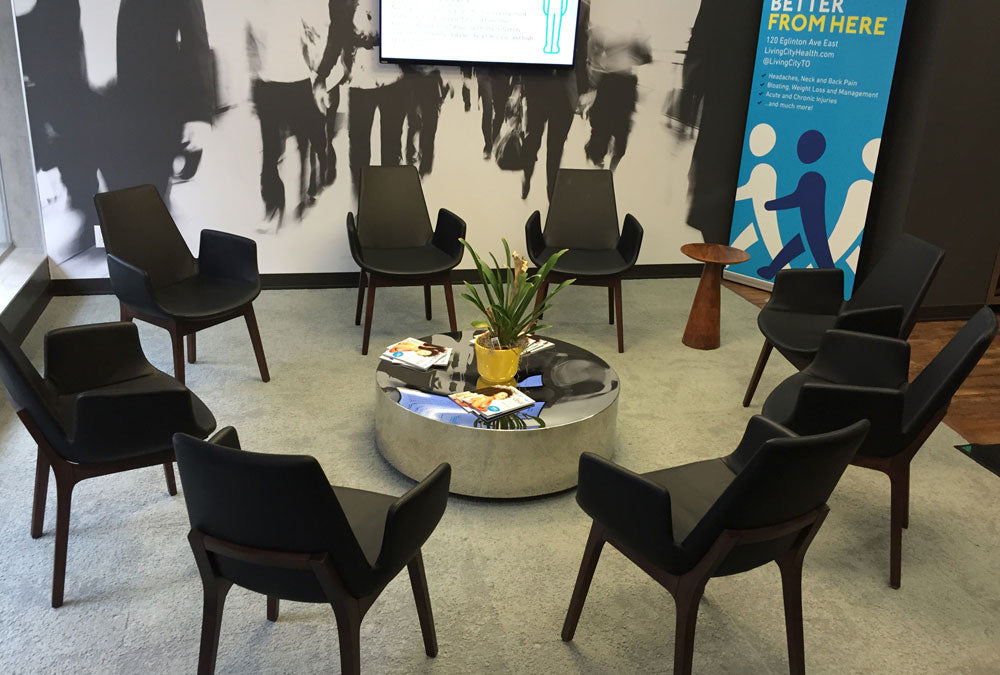 Eiffel Arm Wood Chair by SohoConcept, showing arm wood chairs in live shot.