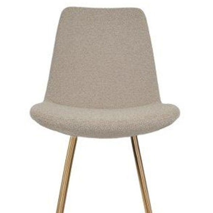 Eiffel Galata Bar Stool by SohoConcept, showing closeup view of eiffel galata bar stool in brass finish steel legs/beige boucle fabric.