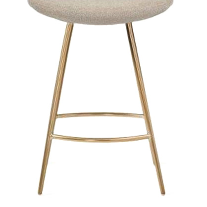 Eiffel Galata Bar Stool by SohoConcept, showing closeup view of eiffel galata bar stool in brass finish steel legs/beige boucle fabric.