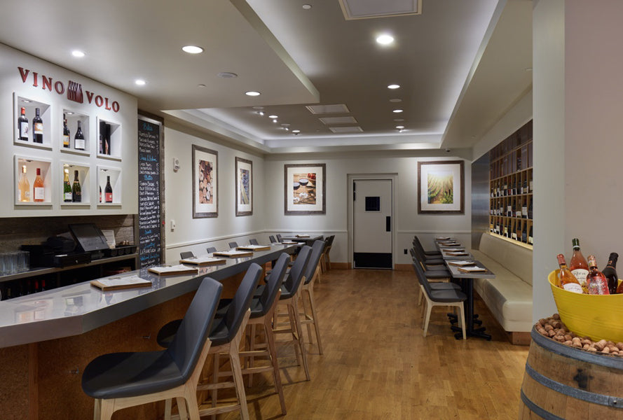 Eiffel Wood Dining Chair-Leather by SohoConcept, showing wood chairs in live shot.