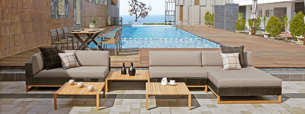 Ekka Right Hand Sectional by Mamagreen, showing ekka right hand sectional with coffee table, ekka sectional chaise and ekka sectional seat in live shot.
