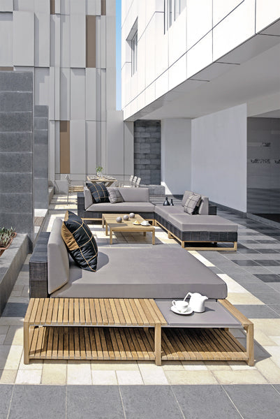 Ekka Right Hand Sectional by Mamagreen, showing ekka right hand sectional with coffee table, ekka sectional chaise and ekka sectional seat in live shot.