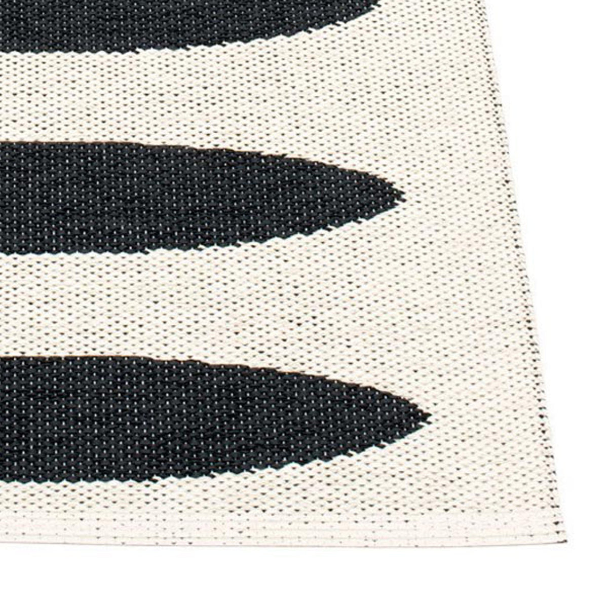 Ella Black & Vanilla Runner Rug by Pappelina, showing closeup view of ella black & vanilla runner rug.