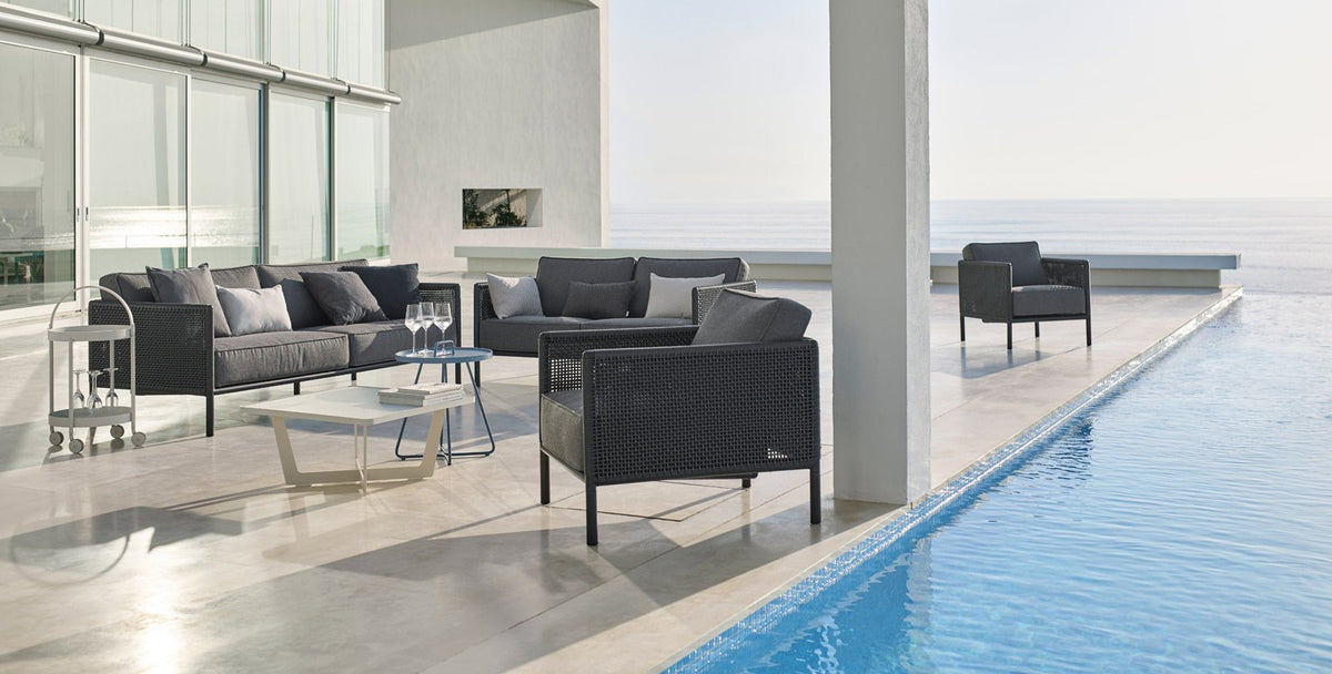 Encore Sofa by Cane-Line, showing encore sofa with live shot.