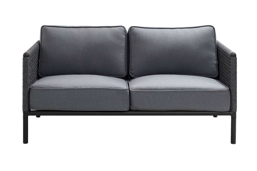 Encore Sofa by Cane-Line, showing front view of encore sofa in lava grey powder coated aluminium/dark grey soft rope.