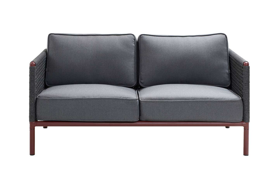 Encore Sofa by Cane-Line, showing front view of encore sofa in bordeaux powder coated aluminium/dark grey soft rope.