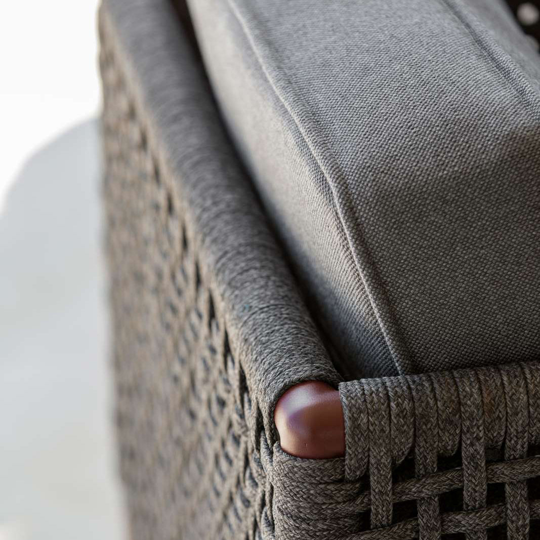 Encore Lounge Chair by Cane-Line, showing closeup view of encore lounge chair in live shot.