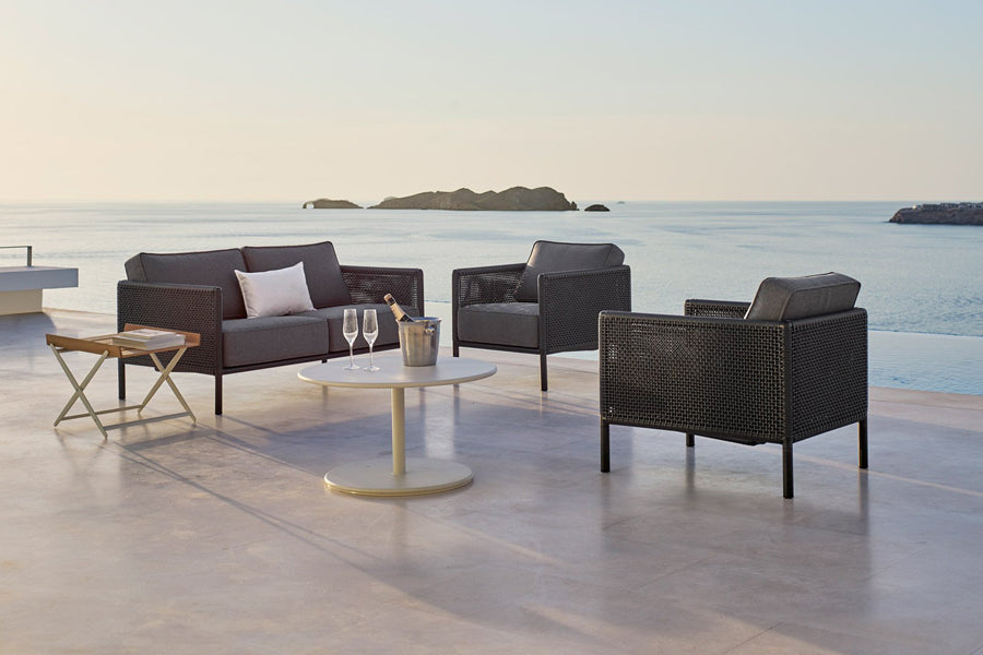 Encore Lounge Chair by Cane-Line, showing encore lounge chair in live shot.