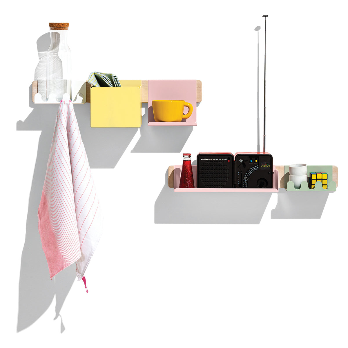 Ens Shelf Accessory by Connubia, showing front view of ens shelf accessory in matt pale pink with other accessories.