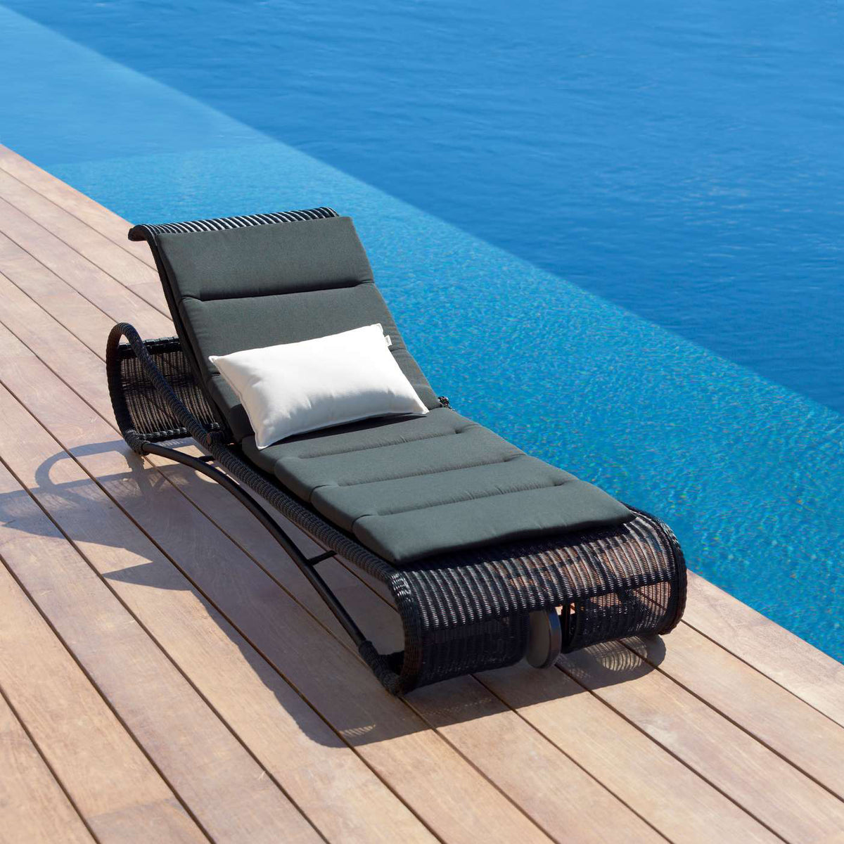 Escape Sunbed by Cane-Line, showing escape sunbed in live shot.