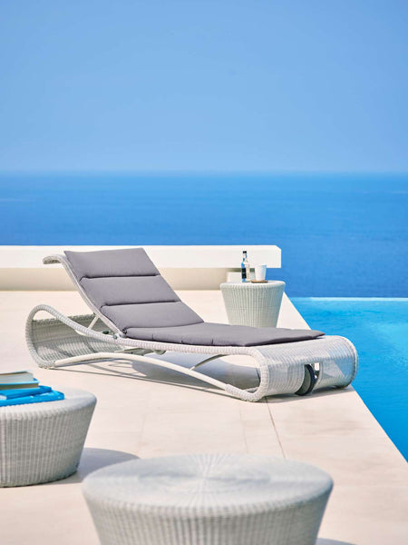 Escape Sunbed by Cane-Line, showing escape sunbed in live shot.