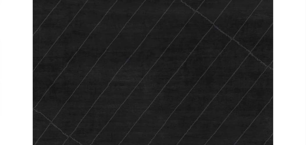 Esporlatu EU100 Rug by Second Studio, showing closeup view of esporlatu eu100 rug by second studio in black & grey.