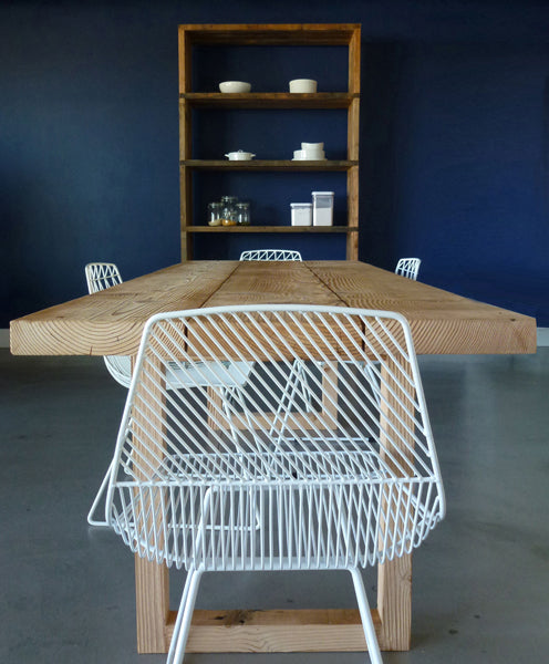 Ethel Side Chair by Bend, showing ethel side chairs with table in live shot.