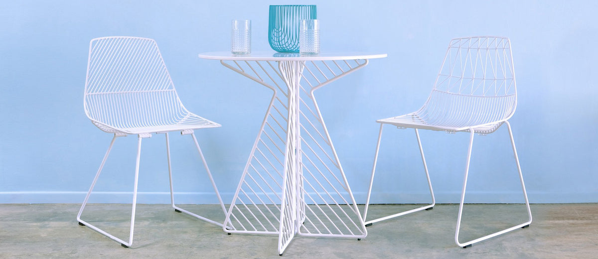 Ethel Side Chair by Bend, showing ethel side chairs with table in live shot.