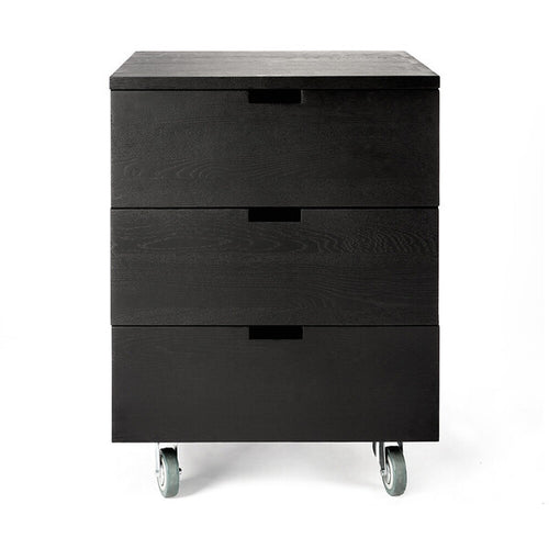Billy Drawer Unit by Ethnicraft, showing front view of black oak drawer unit.