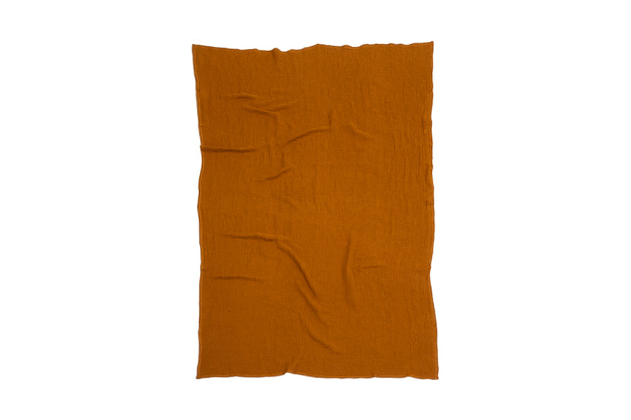 Evy Throws/Cushions by Brita, showing evy throws/cushions in ginger evy woven recycled cotton.